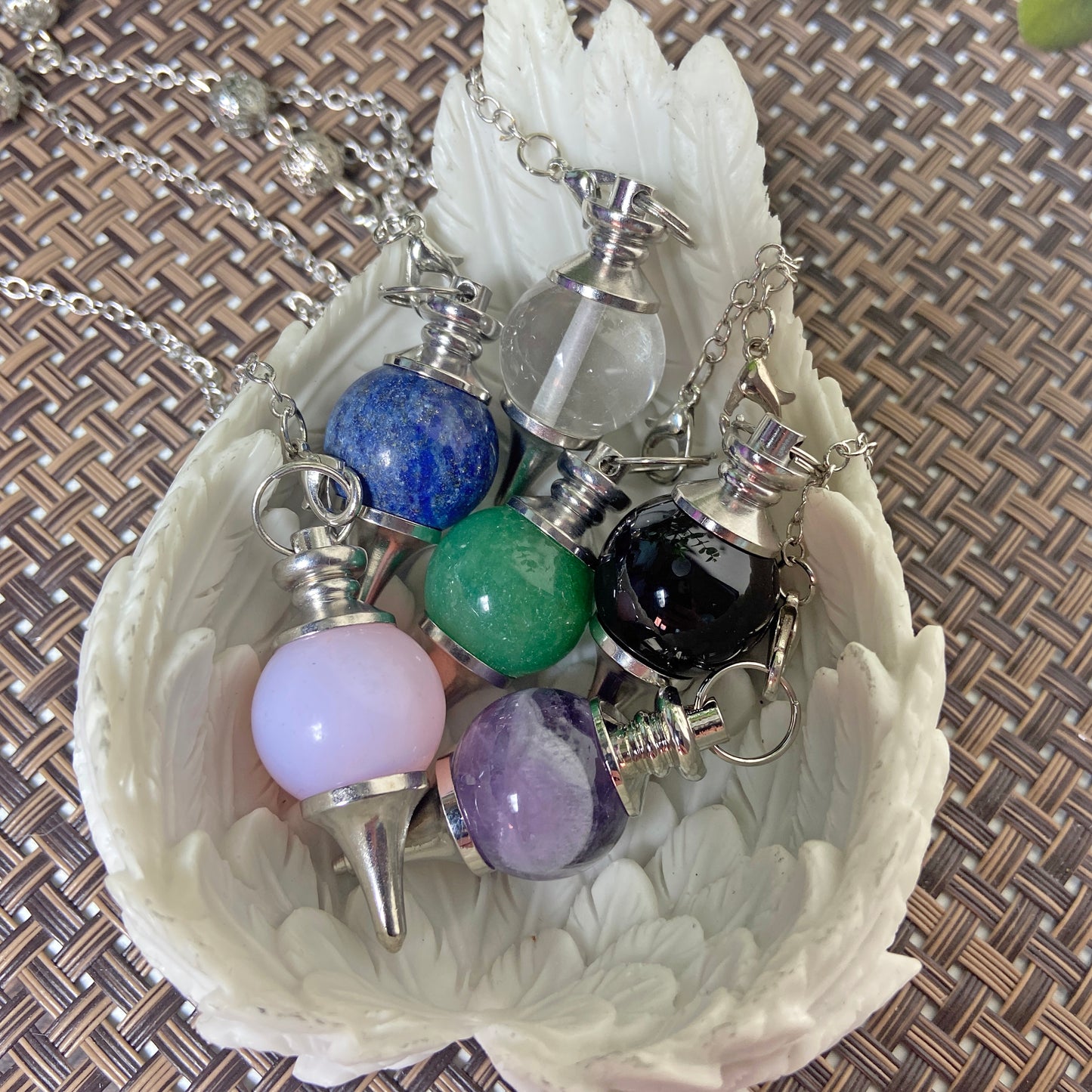 Spherical Crystal Pendulums